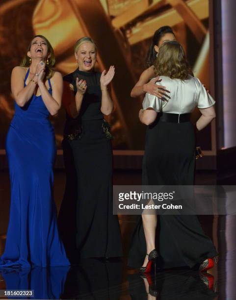 Actresses Tina Fey, Amy Poehler and Merrit Wever appear onstage during the 65th Annual Primetime Emmy Awards held at Nokia Theatre L.A. Live on...