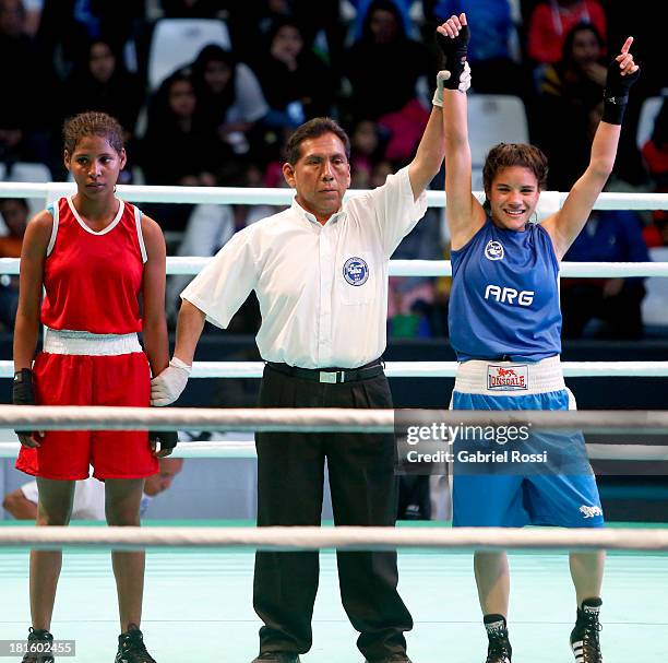 Ayelen Espinosa of Argentina celebrates after defeating Naneth Carrion of Panama during the Women's 48kg Boxing Qualifications as part of the I...