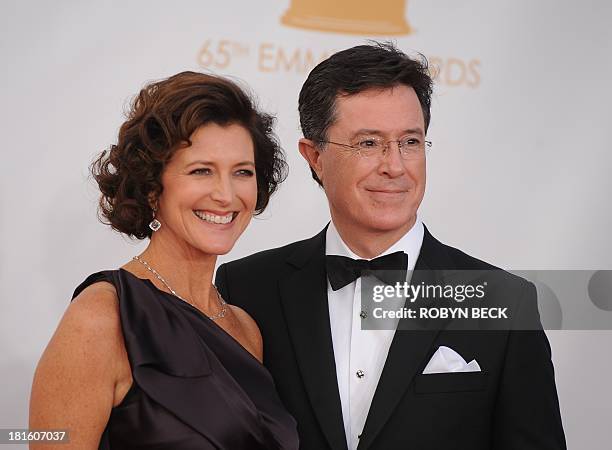 Stephen Colbert and his wife Evelyn McGee-Colbert arrive on the red carpet for the 65th Emmy Awards in Los Angeles, California, on September 22,...