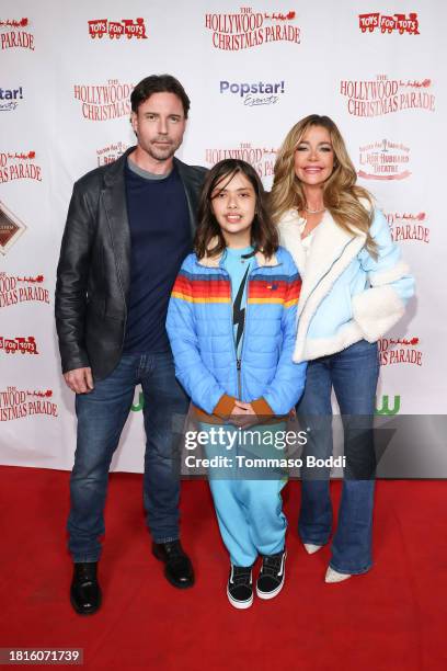 Aaron Phypers, Eloise Joni Richards and Denise Richards attend the 91st anniversary of the Hollywood Christmas Parade, supporting Marine Toys For...