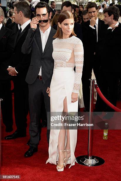 Actress Kate Mara and Max Minghella arrive at the 65th Annual Primetime Emmy Awards held at Nokia Theatre L.A. Live on September 22, 2013 in Los...