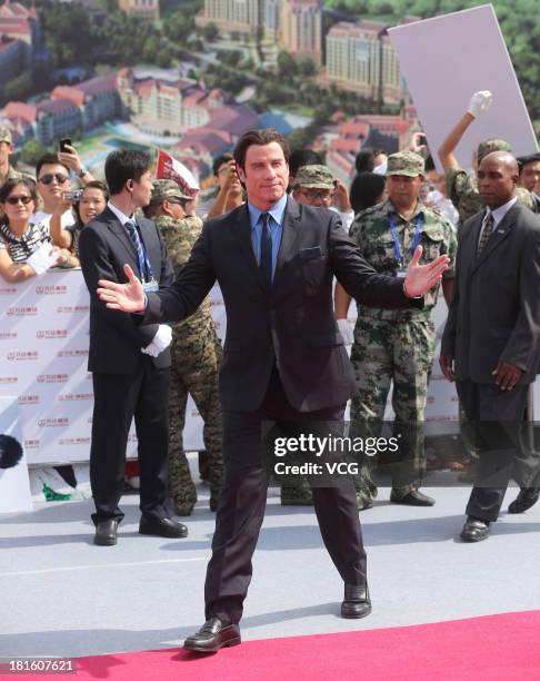 Actor John Travolta attends a launching ceremony for the Qingdao Oriental Movie Metropolis on September 22, 2013 in Qingdao, China.