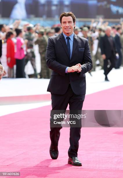 Actor John Travolta attends a launching ceremony for the Qingdao Oriental Movie Metropolis on September 22, 2013 in Qingdao, China.