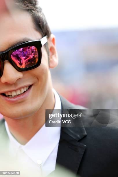 Actor Huang Xiaoming attends a launching ceremony for the Qingdao Oriental Movie Metropolis on September 22, 2013 in Qingdao, China.