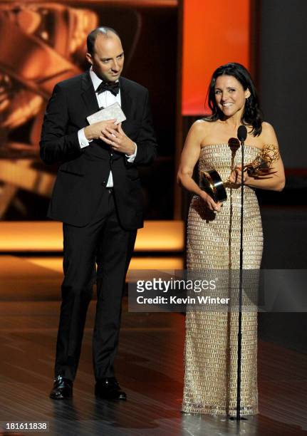 Winner of Best Supporting Actor in a Comedy Series Tony Hale and winner of Best Lead Actress in a Comedy Series, Julia Louis-Dreyfus speak onstage...
