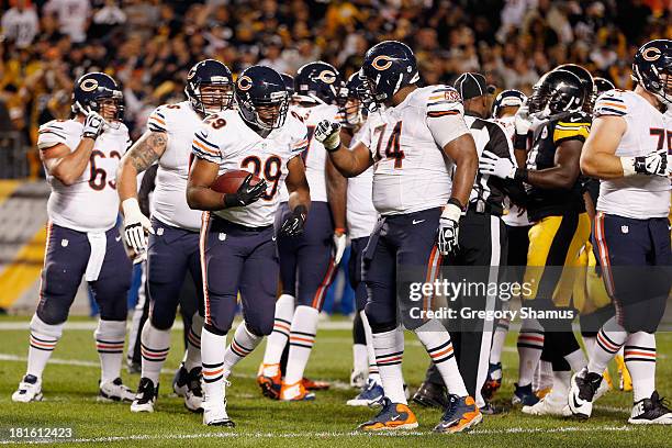 Michael Bush of the Chicago Bears celebrates after rushing 1 yard for a touchdown against the Pittsburgh Steelers at Heinz Field on September 22,...