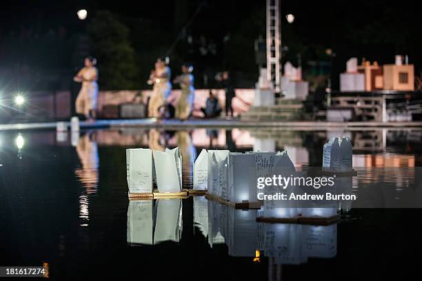 Lanterns float in a temporary man-made pond in Central Park during a ceremony dedicated to honoring peace and peace makers on September 22, 2013 in...