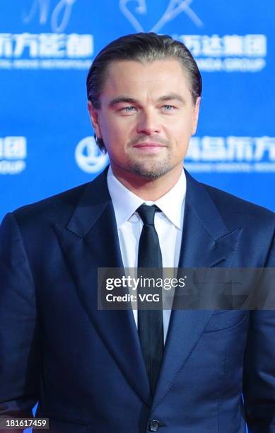 Actor Leonardo DiCaprio arrives on the red carpet during the opening night of the Qingdao Oriental Movie Metropolis at Qingdao Beer City on September...