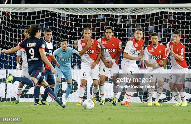 Edinson Cavani of Paris Saint-Germain shooting a free kick before Danijel Subasic; Alberto Silveira; Radamel Falcao, Lucas Ocampo, Yannick Ferreira...