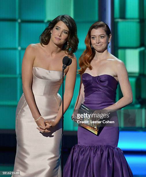 Actresses Cobie Smulders and Alyson Hannigan speak onstage during the 65th Annual Primetime Emmy Awards held at Nokia Theatre L.A. Live on September...