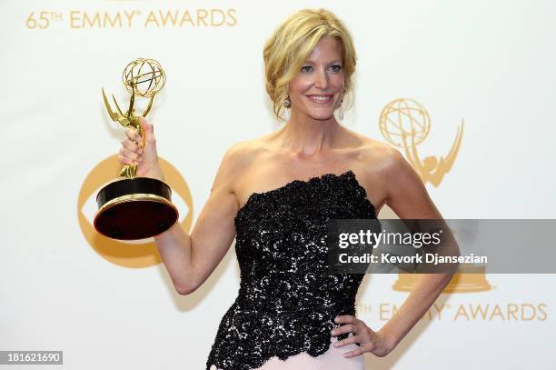 Actress Anna Gunn, winner of Outstanding Supporting Actress in a Drama Series award for 'Breaking Bad,' poses in the press room during the 65th...