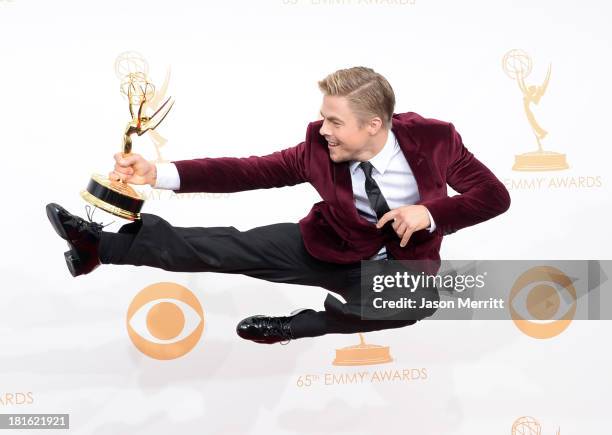 Choreographer Derek Hough, winner of the Best Choreography Award for "Dancing With The Stars" poses in the press room during the 65th Annual...