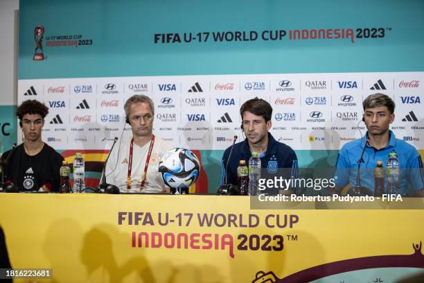 Germany Noah Darvich, Germany Head Coach Christian Wueck, Argentina Head Coach Diego Placente, and Argentina Agustin Ruberto attend the pre-match...