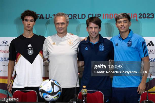 Germany Noah Darvich, Germany Head Coach Christian Wueck, Argentina Head Coach Diego Placente, and Argentina Agustin Ruberto pose during the...