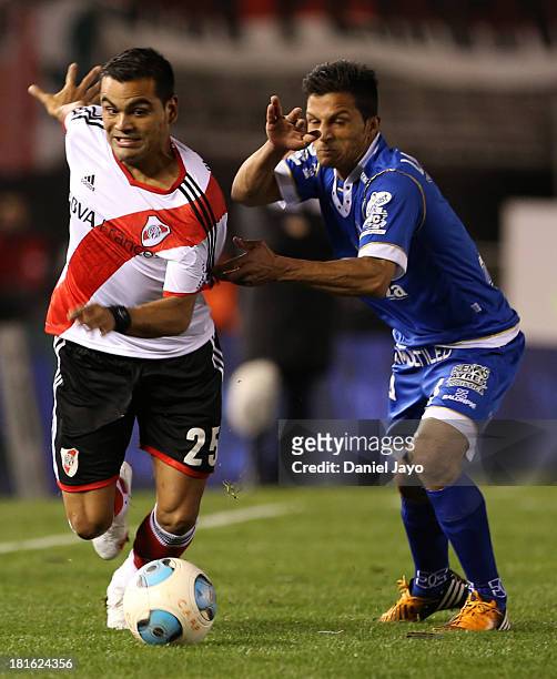 Gabriel Mercado, of River Plate, and Marcelo Bustamante, of All Boys, fight for the ball during a match between River Plate and All Boys as part of...