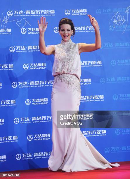 Actress Kate Beckinsale arrives on the red carpet during the opening night of the Qingdao Oriental Movie Metropolis at Qingdao Beer City on September...