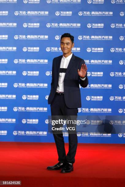 Actor Ethan Ruan arrives on the red carpet during the opening night of the Qingdao Oriental Movie Metropolis at Qingdao Beer City on September 22,...