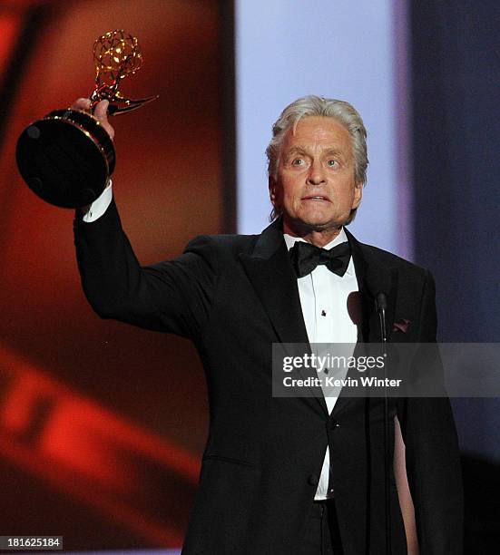 Actor Michael Douglas, winner of the Best Lead Actor in a Miniseries or Movie Award for 'Behind The Candelabra' speaks onstage during the 65th Annual...