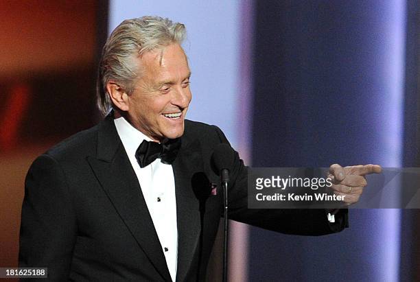 Actor Michael Douglas, winner of the Best Lead Actor in a Miniseries or Movie Award for 'Behind The Candelabra' speaks onstage during the 65th Annual...