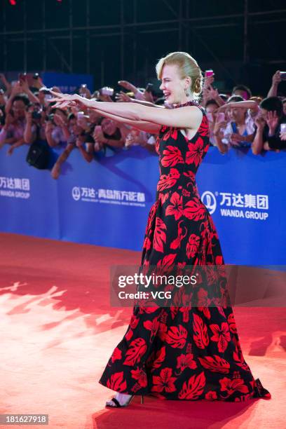 Actress Nicole Kidman arrives on the red carpet during the opening night of the Qingdao Oriental Movie Metropolis at Qingdao Beer City on September...