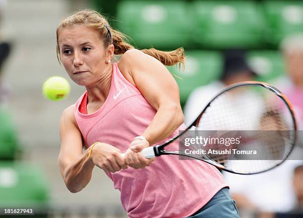 Annika Beck of Germany in action during her women's singles first round match against Ana Ivanovic of Serbia during day two of the Toray Pan Pacific...