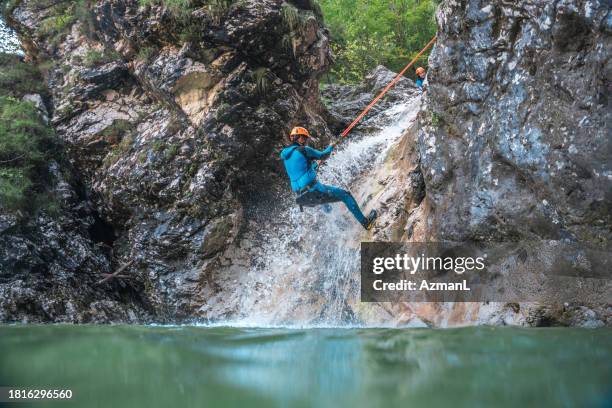 mountain thrill seeker - abseiling stock pictures, royalty-free photos & images