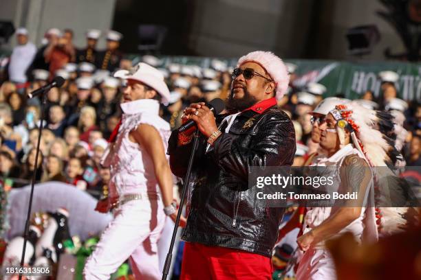 Nicholas Manelick, Victor Willis, and Javier Perez of Village People perform during the 91st anniversary of the Hollywood Christmas Parade,...