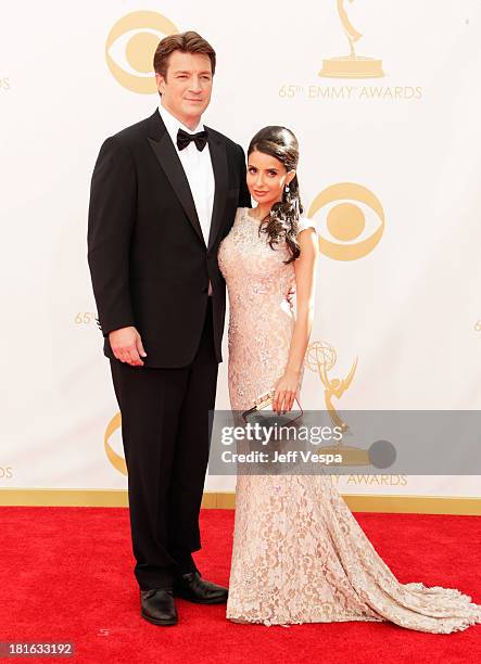 Actor Nathan Fillion and Mikaela Hoover arrive at the 65th Annual Primetime Emmy Awards held at Nokia Theatre L.A. Live on September 22, 2013 in Los...