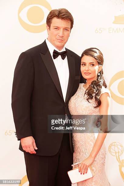 Actor Nathan Fillion and Mikaela Hoover arrive at the 65th Annual Primetime Emmy Awards held at Nokia Theatre L.A. Live on September 22, 2013 in Los...