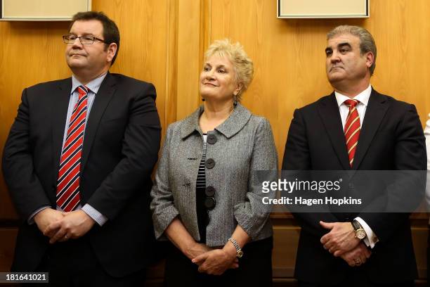 Labour MPs Grant Robertson, Annette King and Clayton Cosgrove look on during a press conference at Parliament on September 23, 2013 in Wellington,...