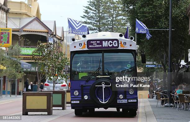 Dockers supporters bus drives down South Terrace before departing to Melbourne on September 23, 2013 in Fremantle, Australia. The Fremantle Dockers...