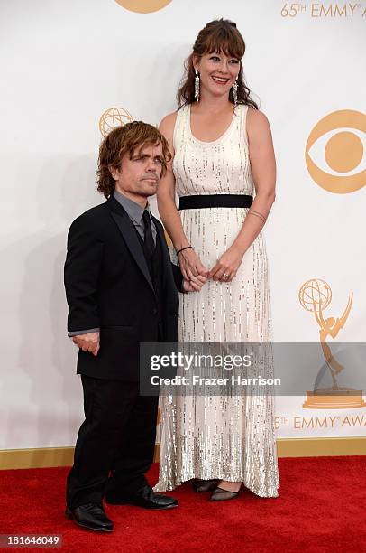 Actor Peter Dinklage and wife Erica Schmidt arrive at the 65th Annual Primetime Emmy Awards held at Nokia Theatre L.A. Live on September 22, 2013 in...