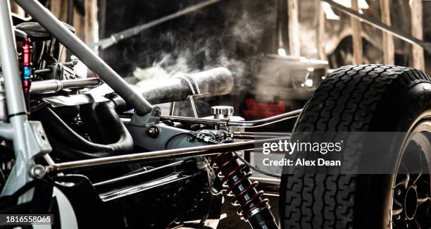 vintage sports car exhaust - speeding car stock pictures, royalty-free photos & images