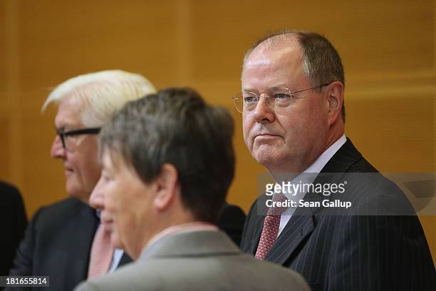 Peer Steinbrueck , chancellor candidate of the German Social Democrats , arrives for a meeting of the SPD governing board on the first day after...