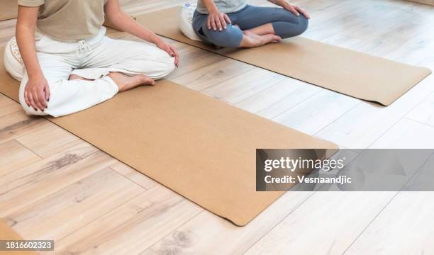 yoga class - mat stock pictures, royalty-free photos & images