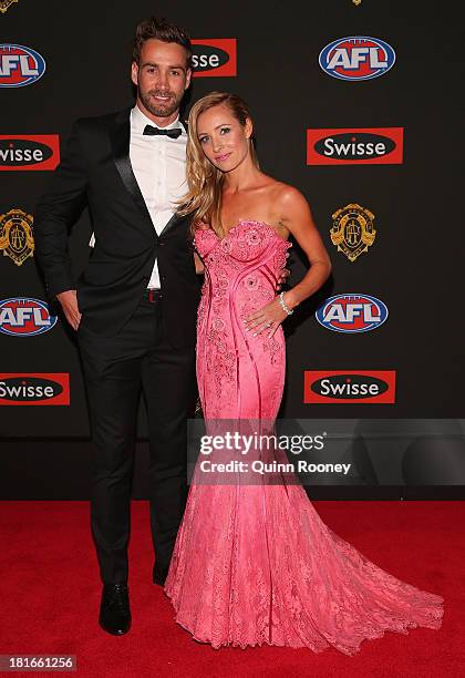 Andrew Walker of the Blues and his partner Kylie Battye arrive ahead of the 2013 Brownlow Medal at Crown Palladium on September 23, 2013 in...