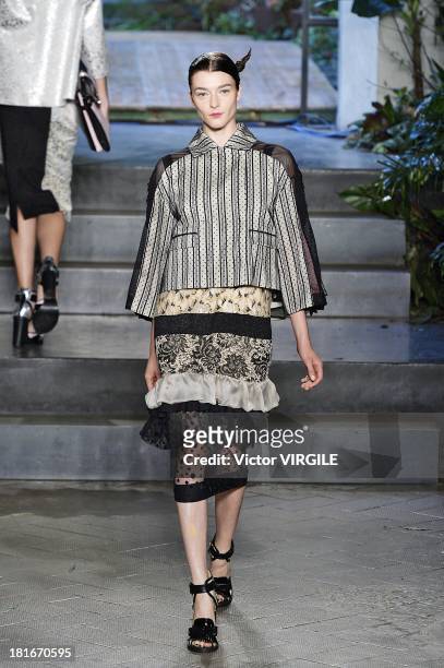 Model walks the runway during the Antonio Marras show as a part of Milan Fashion Week Womenswear Spring/Summer 2014 on September 20, 2013 in Milan,...