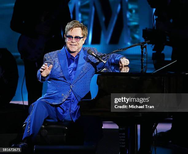 Elton John performs onstage during the 65th Annual Primetime Emmy Awards held at Nokia Theatre L.A. Live on September 22, 2013 in Los Angeles,...