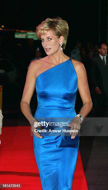 Princess Diana, Princess of Wales, wearing a Versace dress as she attends a dinner dance on October 31, 1996 in Sydney, Australia.