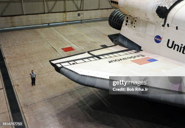 Space shuttle Endeavour sits inside the United Airlines hanger at Los Angeles International Airport waiting for final journey to the California...