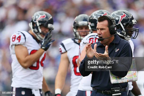 Head coach Gary Kubiak of the Houston Texans motions from the sidelines during the first half of their 30-9 loss to the Baltimore Ravens at M&T Bank...