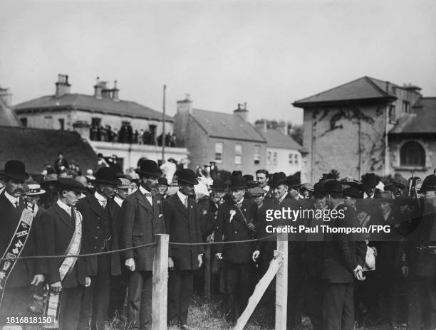 Irish politician and judge Sir Edward Carson, cofounder of the loyalist paramilitary organisation the Ulster Volunteer Force , during an inspection...