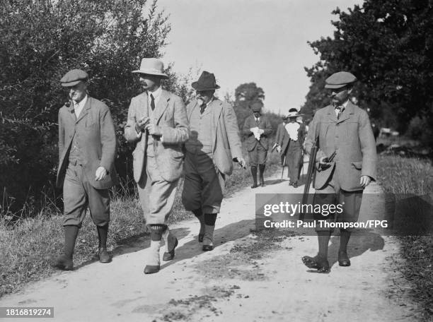 British politician Sir Edward Grey, British politician John Ward, British politician Oliver Robinson, Marquess of Ripon, and Mr Sheridan attend a...