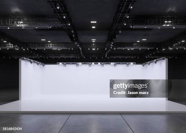 a dark room under the light - theaterdecor stockfoto's en -beelden