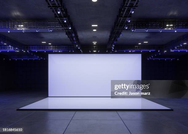 a dark room under the light - stage set stock pictures, royalty-free photos & images