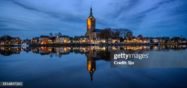 hasselt sunset view on the riverbank of the zwarte water - hasselt stock pictures, royalty-free photos & images