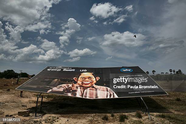 Large billboard by the Australian government is seen discouraging Tamils to come to their shores outside Jaffna, Sri Lanka July 9, 2013. War's end...