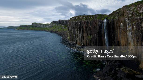 scenic view of sea against sky - isle of skye waterfall stock pictures, royalty-free photos & images