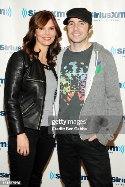 Actress Jeanne Tripplehorn and Raw Dog host Mark Says Hi visit SiriusXM Studios on September 23, 2013 in New York City.
