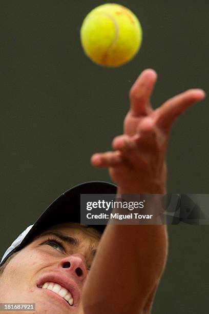 Pedro Iamachkine of Peru makes serves during his singles semifinal match as part of the I ODESUR South American Youth Games at Club Lawn Tenis de la...